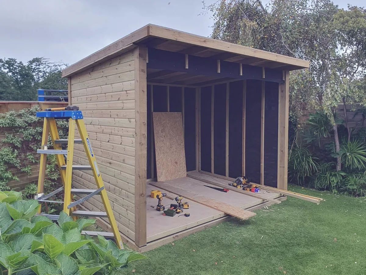 Timber frame being constructed